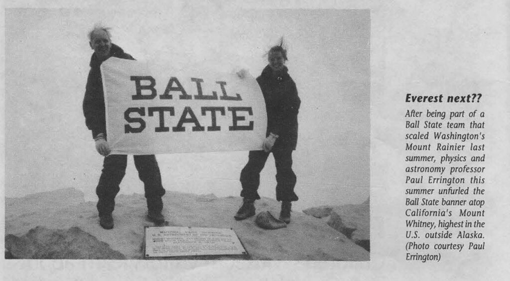 Two climbers, including Ball State physics and astronomy professor Dr. Paul R. Errington, hold a Ball State banner on California’s Mount Whitney in a newspaper clipping about Errington’s mountaineering.