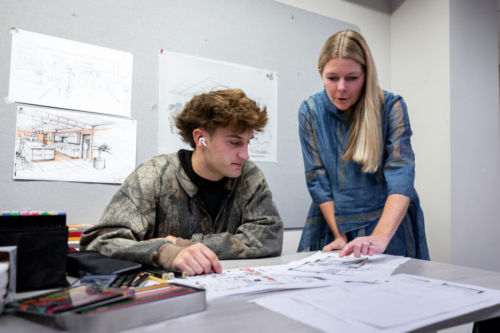 Student and Professor discuss building designs