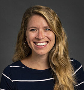 headshot of a blonde woman smiling