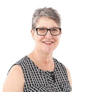 headshot of a woman with glasses