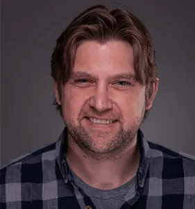 Headshot of Ball State University faculty member Dr. Adam Lueke.