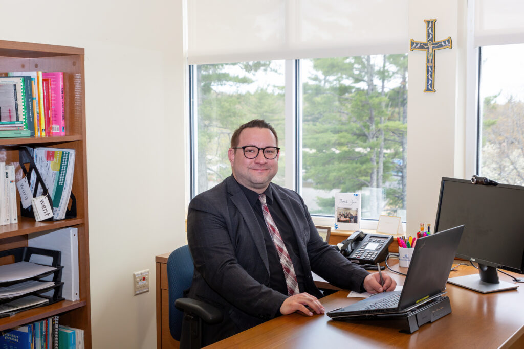 Ball State University alum and Assistant Professor of Special Education, Stephen Marositz, sits at his desk overlooking theSt. Joseph’s College of Maine campus, while working on his computer. Amy has her EdD in Educational Administration and Supervision from Ball State.