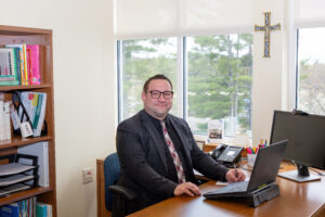 Ball State University alum and Assistant Professor of Special Education, Stephen Marositz, sits at his desk overlooking theSt. Joseph’s College of Maine campus, while working on his computer. Amy has her EdD in Educational Administration and Supervision from Ball State.