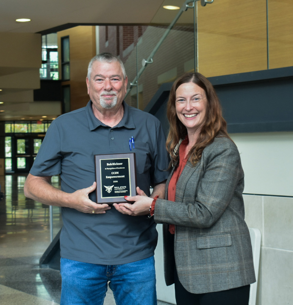 Dean McCauliff poses with Bob Rickner for the CCIM Empowerment award at the 2026 CCIM Faculty Awards Ceremony.
