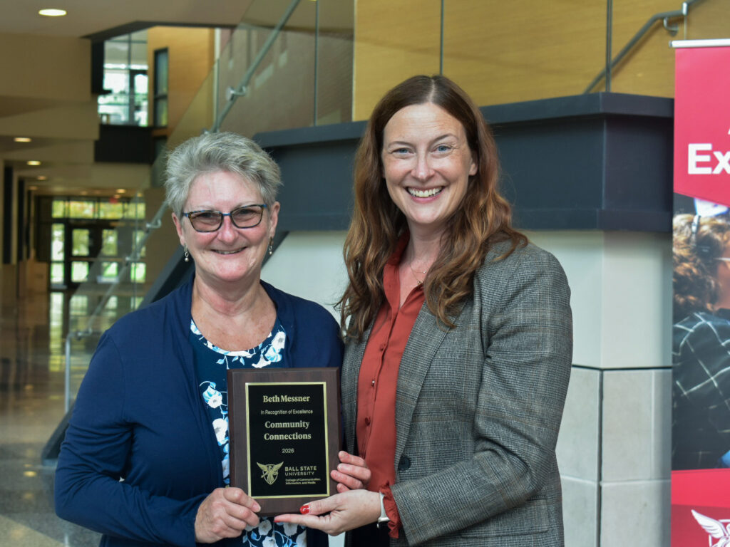 Dean McCauliff poses with Beth Messner for the CCIM Community Connections award at the 2026 CCIM Faculty Awards Ceremony.