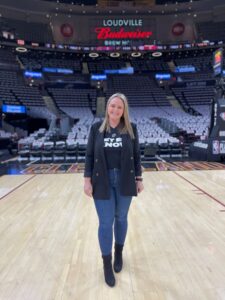Jordyn is standing in the Rocket Mortgage FieldHouse in Cleveland.