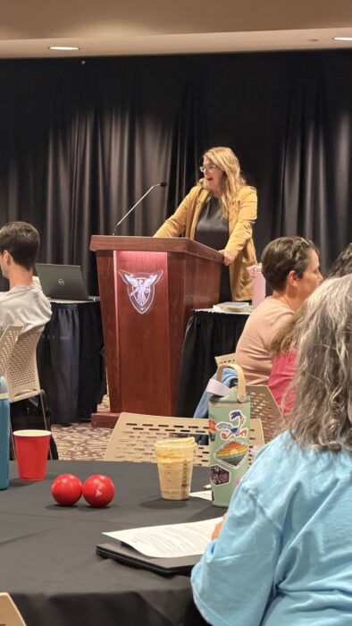 An Image showing Dr. Jill Christman delivering her keynote address.
