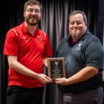 Ethan Hines (AD Disability Services) takes photo with James Conner, one of our ACCESS Award winners