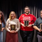 ACCESS Award Winners Olivia Vecchiolli, Marci Mullaney, Kyle McCord, and James Conner pose for a group photo with their award plaques