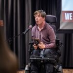 Student Dillon Rosenlieb addresses the audience after being presented the Markle Award