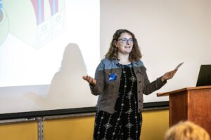 Digital Corps alumni Jana Lowery gives a presentation.