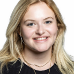 a woman with blonde hair and a black shirt